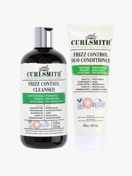 Curlsmith Frizz Control Cleanser and Duo Conditioner on a grey background